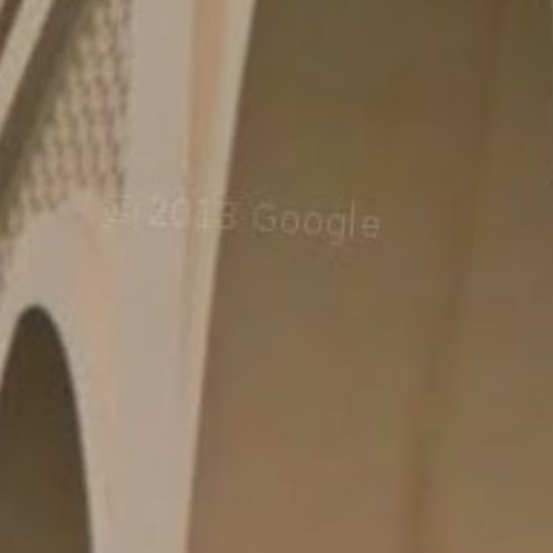 a screenshot of google streetview; a piece of vaulted architecture. copyright google is across the image